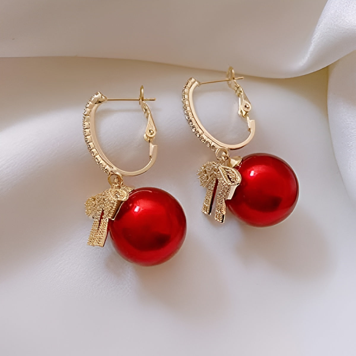 Round Cubic Zirconia Earrings With Bow Design / Ruchi 