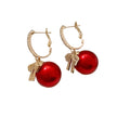 Round Cubic Zirconia Earrings With Bow Design / Ruchi 