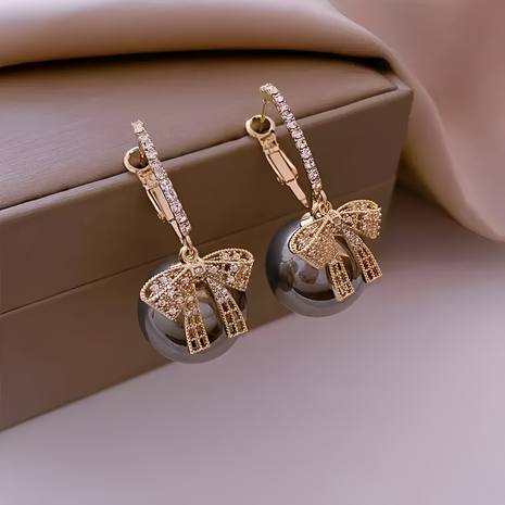 Round Cubic Zirconia Earrings With Bow Design