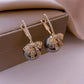 Round Cubic Zirconia Earrings With Bow Design / Ruchi 