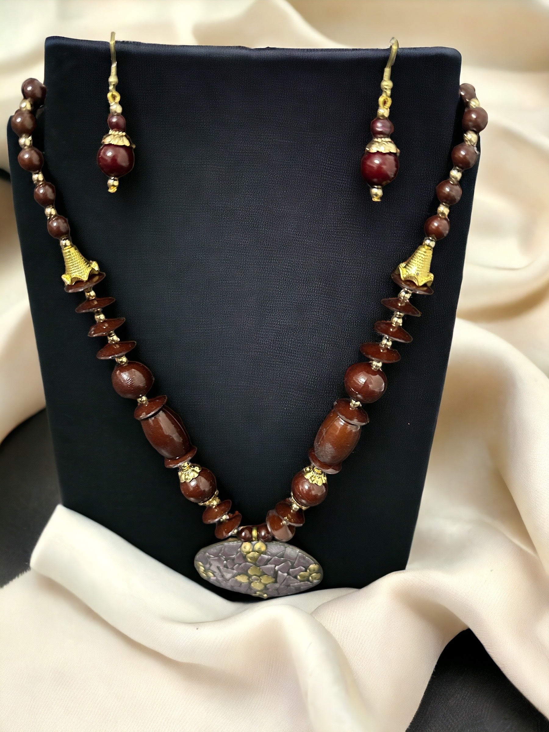 Captivating Semi-Precious Stone Brown Wooden Beaded Necklace And Earrings Set / Ruchi