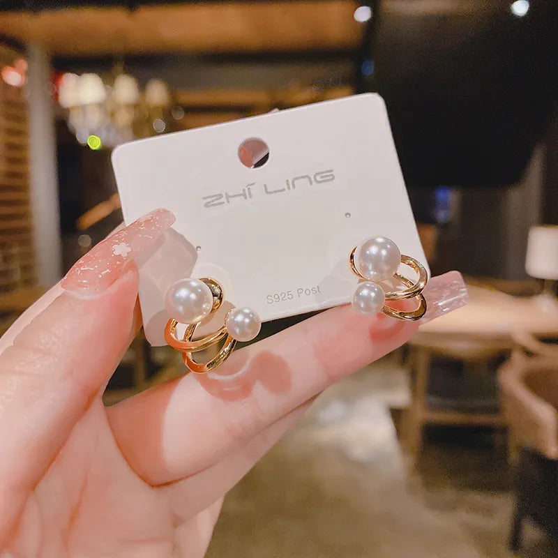 Trendy Round Cubic Zirconia Earrings / Ruchi 