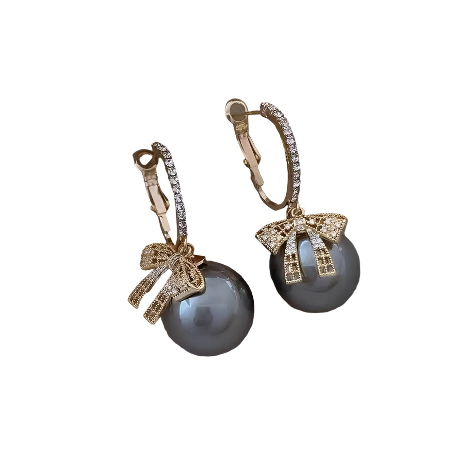 Round Cubic Zirconia Earrings With Bow Design / Ruchi 