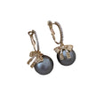 Round Cubic Zirconia Earrings With Bow Design / Ruchi 
