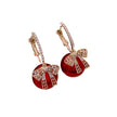 Round Cubic Zirconia Earrings With Bow Design / Ruchi 