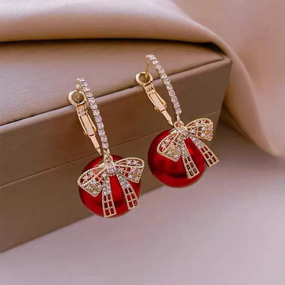 Round Cubic Zirconia Earrings With Bow Design / Ruchi 