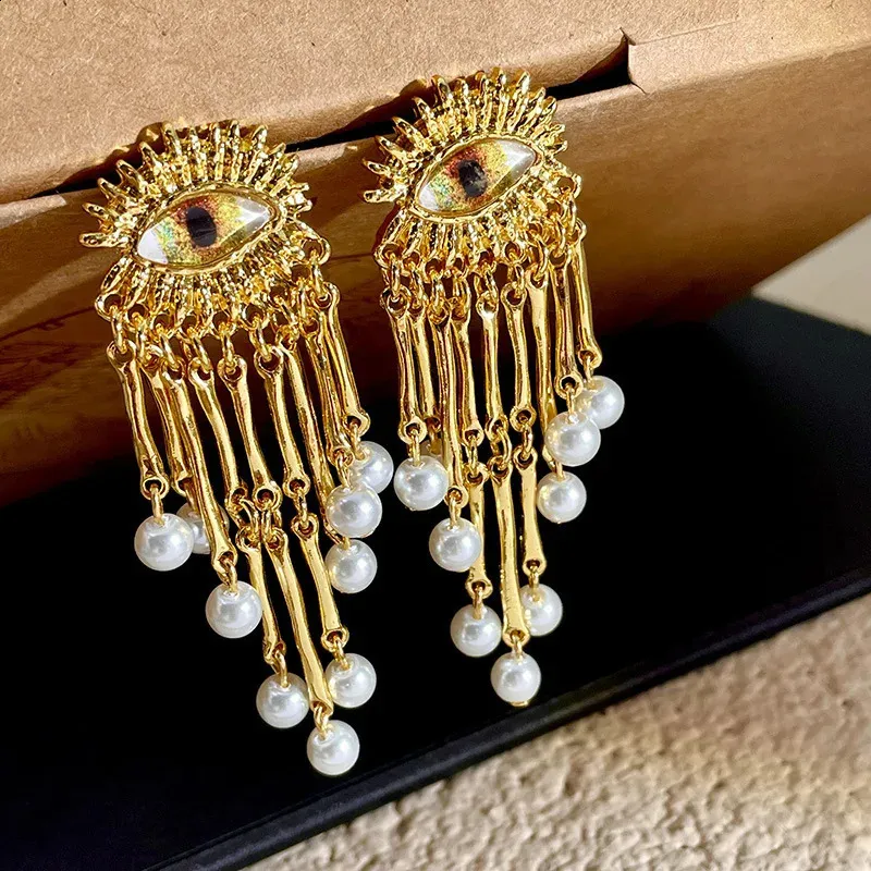 Royal Eye Design Metallic Pearl Earrings / Ruchi