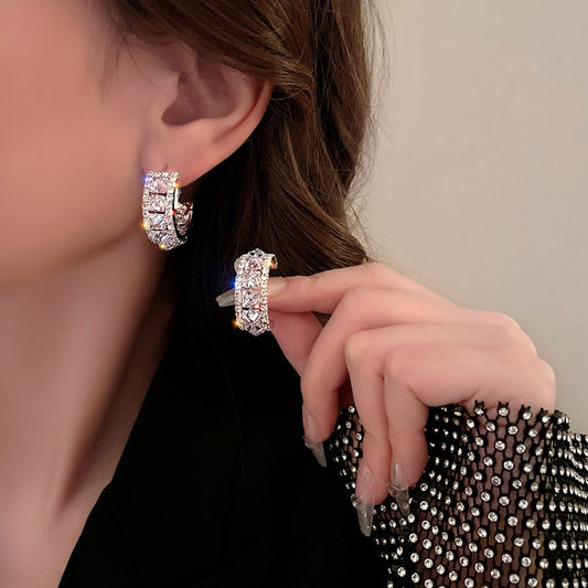 Enticing Cubic Zirconia Metal Round Hoop Earrings / Ruchi