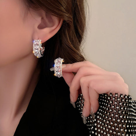 Enticing Cubic Zirconia Metal Round Hoop Earrings / Ruchi