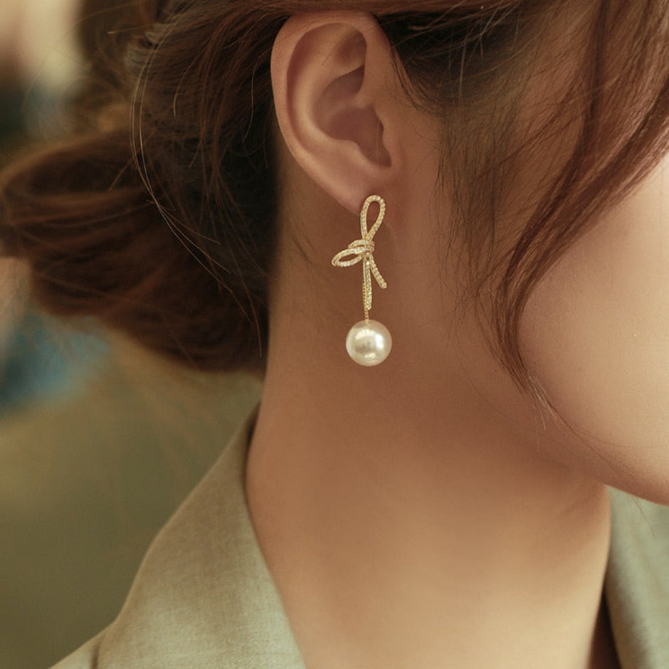 Golden Bowknot Pearl Zirconia Metal Earrings / Ruchi