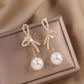 1 Pair Golden Bowknot Pearl Zirconia Metal Earrings