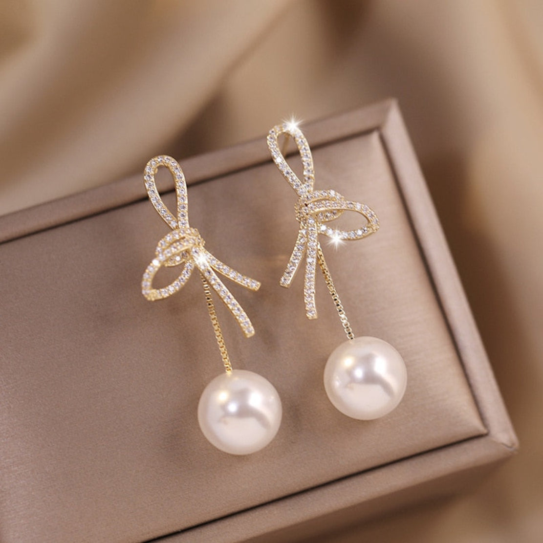 Golden Bowknot Pearl Zirconia Metal Earrings / Ruchi