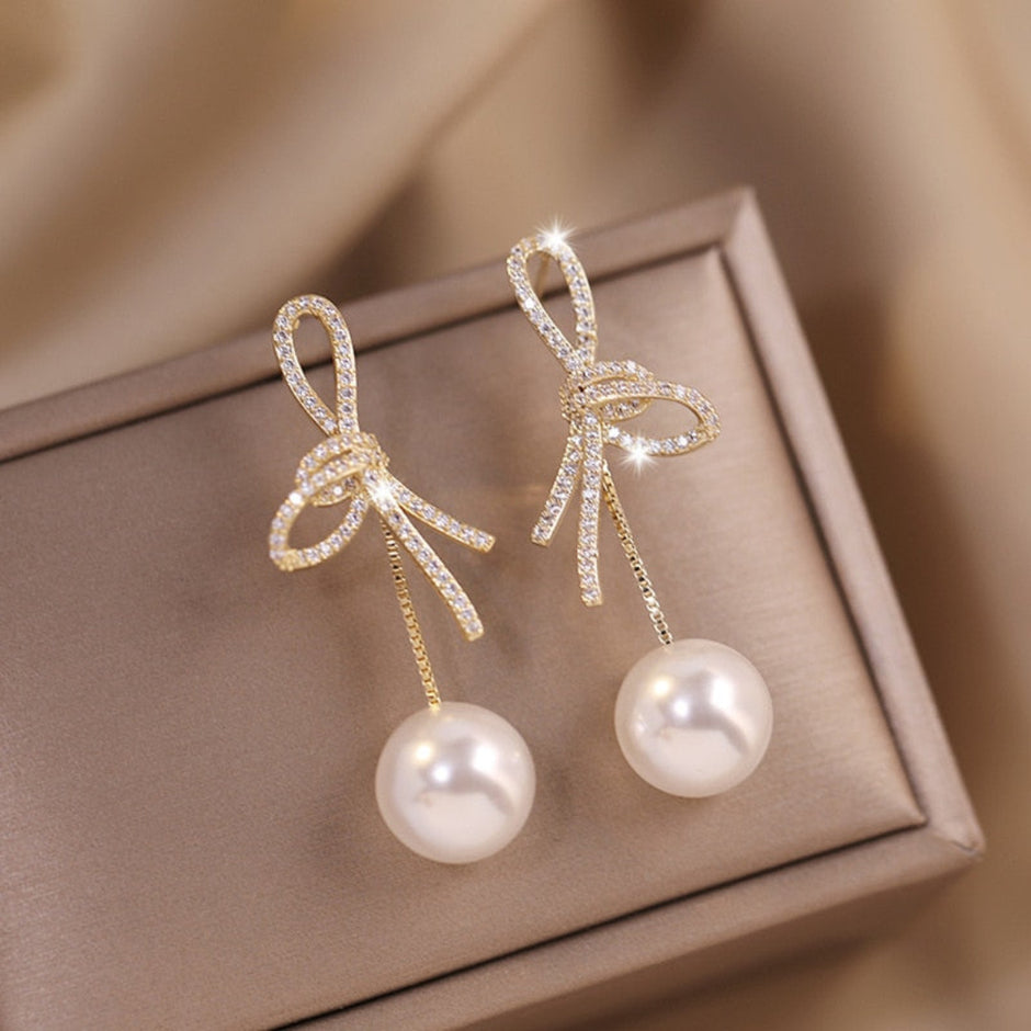 Golden Bowknot Pearl Zirconia Metal Earrings / Ruchi