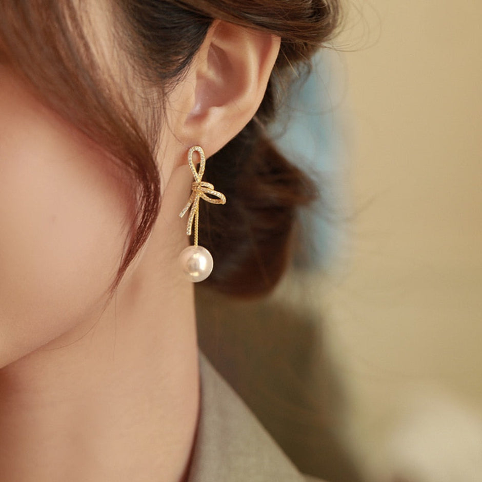 Golden Bowknot Pearl Zirconia Metal Earrings / Ruchi