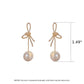 1 Pair Golden Bowknot Pearl Zirconia Metal Earrings
