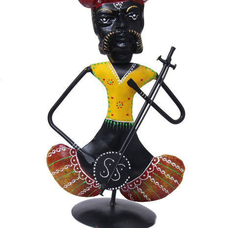 Metallic Doll Playing Musical Instrument / Ruchi